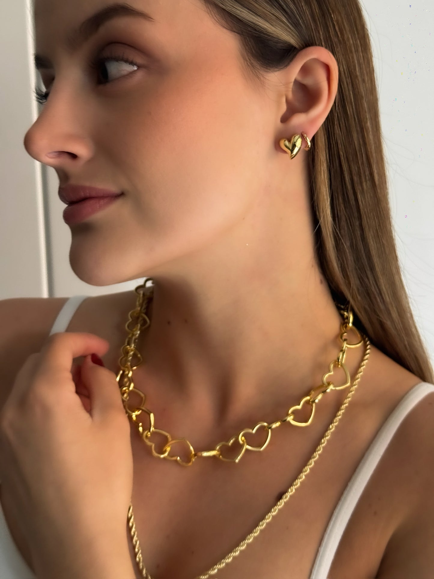 ARETES TWIN HEARTS